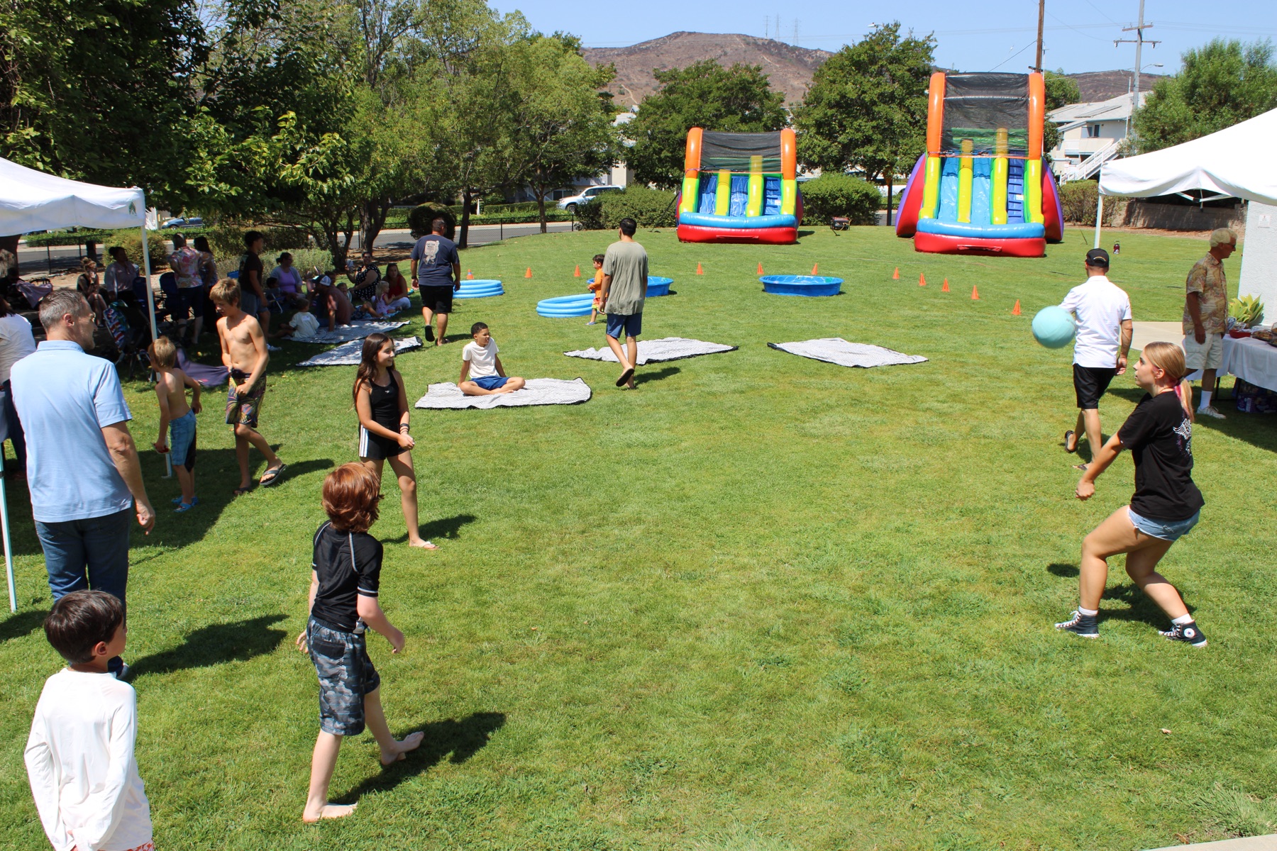 Kids playing on the church lawn at Village Church